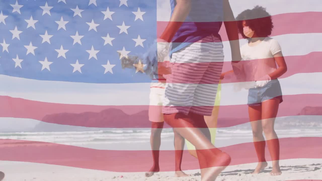 얼굴 마스크를 쓰고 해변을 청소하는 사람들 위에 미국 국기의 애니메이션
