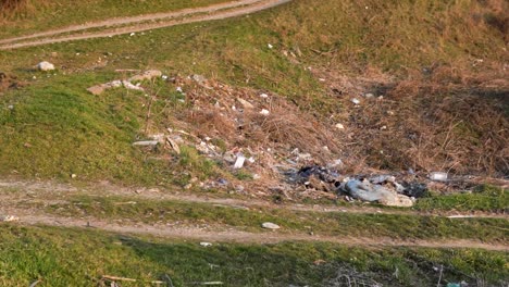 garbage pollution at open area in open field