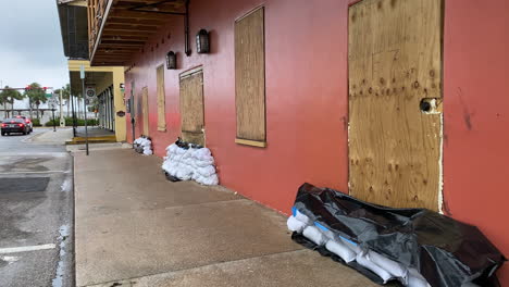 boarding up stores and businesses preparing for hurricane storm to make landfall