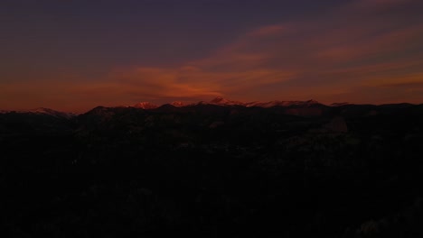 Snow-Capped-Mountains-Sunrise-Aerial-Rising-Shot-4K