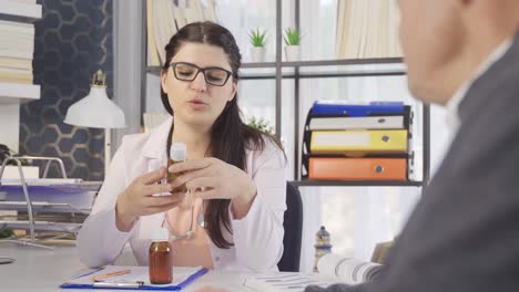 Female-doctor-giving-medicine-to-her-patient,-medical-intervention.