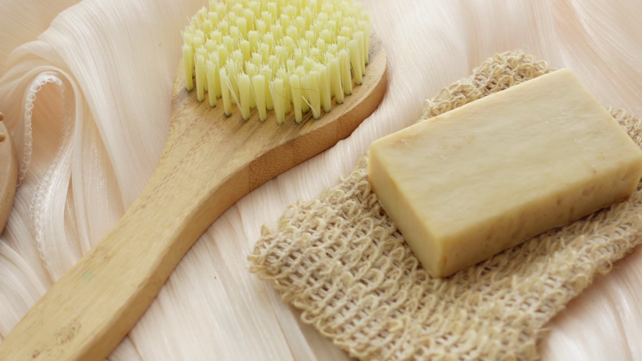 Close-Up of Natural Bath and Body Care Items on Silk
