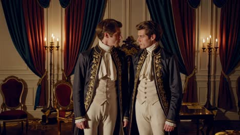 two elegant gentlemen in 18th-century attire