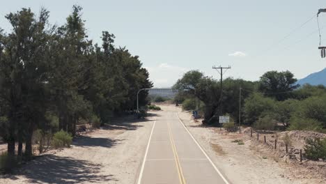 Ruta-40-heading-towards-Quebrada-de-las-Flechas,-where-the-pavement-ends-and-a-dirt-road-begins