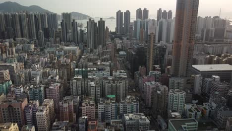 urban drone shot over kowloon hong kong