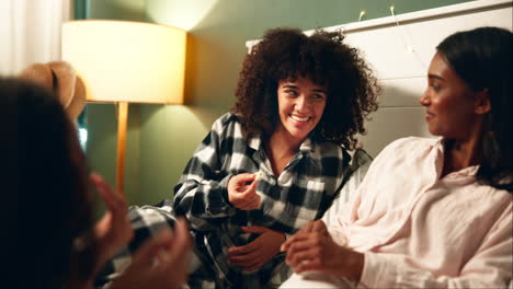 friends laughing together in pajamas