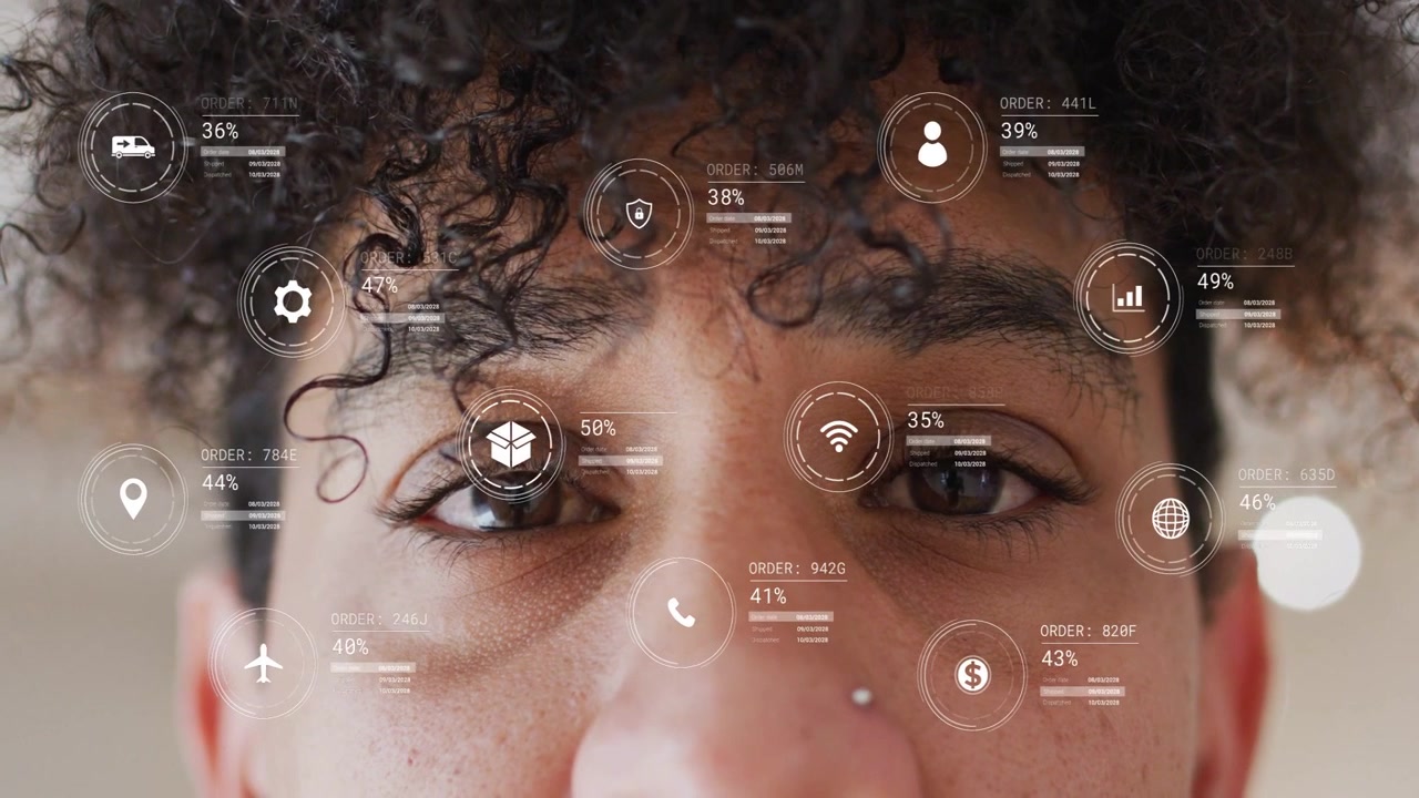 Vertical video: Man opening eyes, causing AR icons growing and aligning around eyes, analyzing data