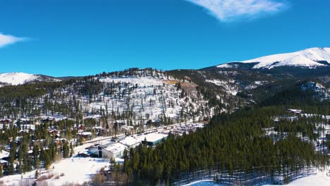 full parking lot in winter mountains