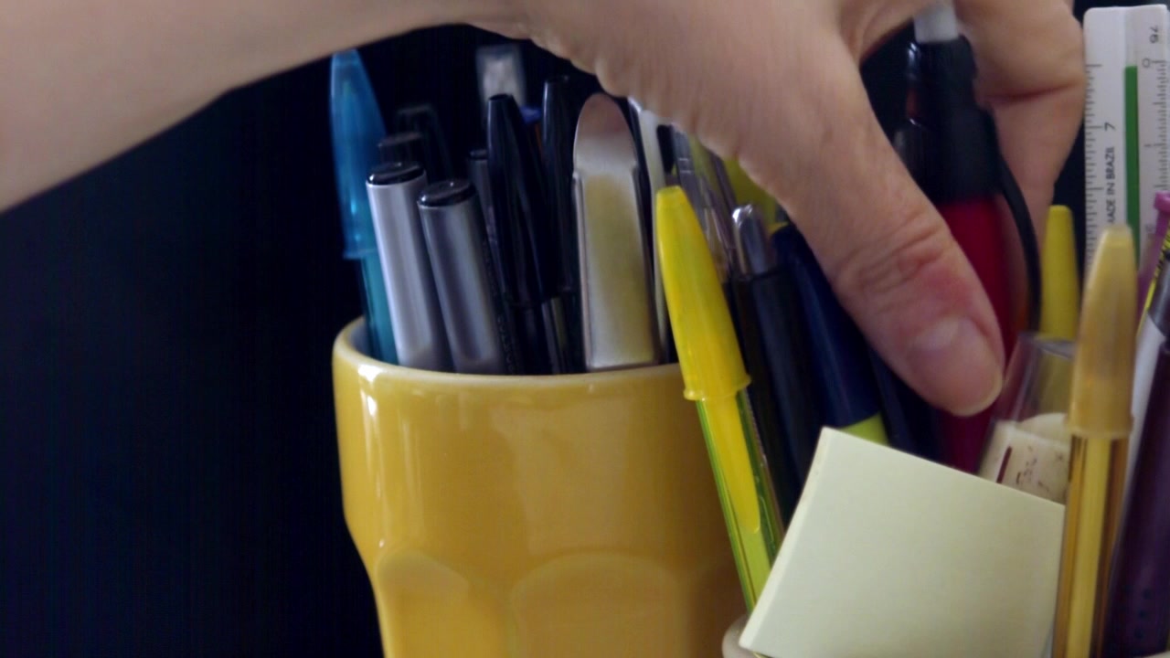 Pens and pencils, sharp and new, ink that’s bold, black and blue