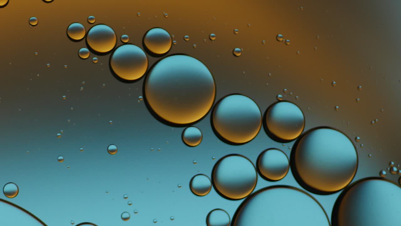 물 위에 떠다니는 기름방울의 다채로운 예술적.