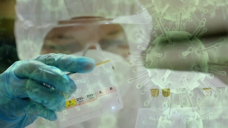Animation of virus cells over biracial male scientist working in lab