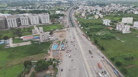 aerial view of highway and cityscape in india