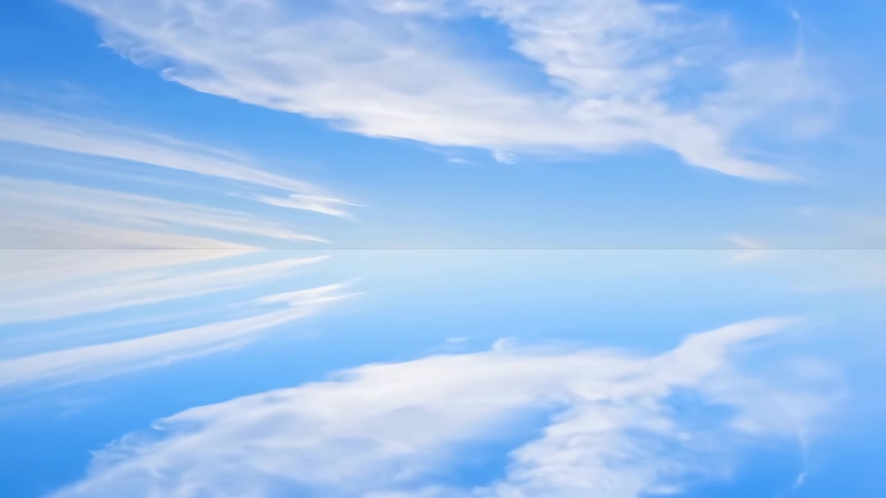 Cielo con nuvole, nessuna azione osservata, in una scena di cielo diurno all'aperto, con nuvole e cielo, da una prospettiva aerea o ad alta quota, con accenti blu e bianchi e un'atmosfera serena e pacifica.