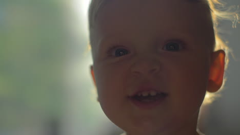 portrait of one year old smiling baby girl