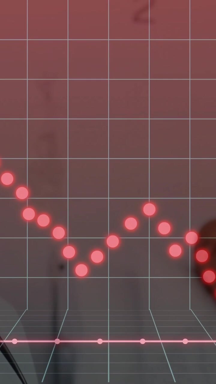 Smiling doctor with stethoscope, red stock market graph animation over background
