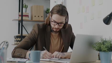 man working at home office