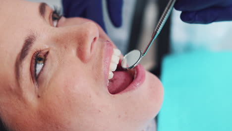 a woman receiving a dental exam