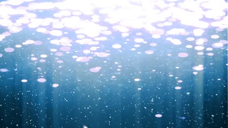 la nieve cayendo con la luz brillante de navidad