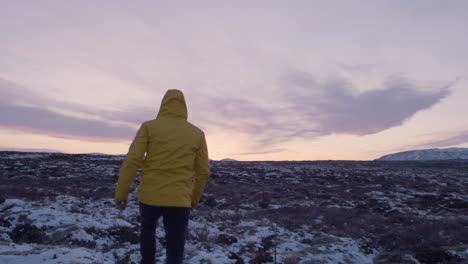 man in iceland alone in the wilderness