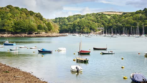 fowey estuary timelapse with small boats bobbing in the water