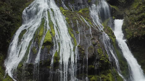 Slow-rise-up-length-of-beautiful-Panther-Creek-Falls-in-Washington-State's-Columbia-Gorge,-flowing-out-of-old-growth-forest