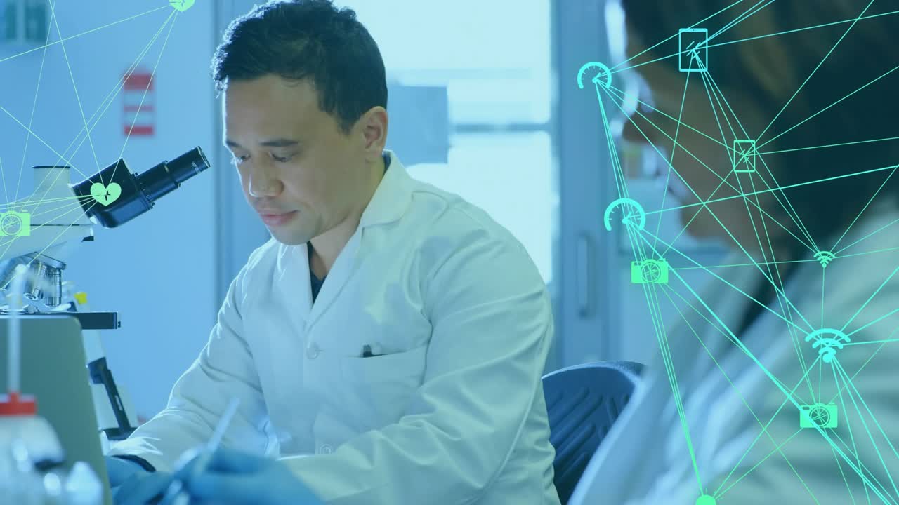 Male tech in lab using pipette at microscope while female working on data, clear overlay appearing