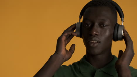 african american man on yellow background.