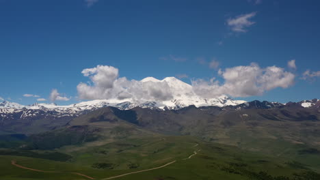 Elbrus-Region.-Flying-over-a-highland-plateau.-Beautiful-landscape-of-nature.-Mount-Elbrus-is-visible-in-the-background.