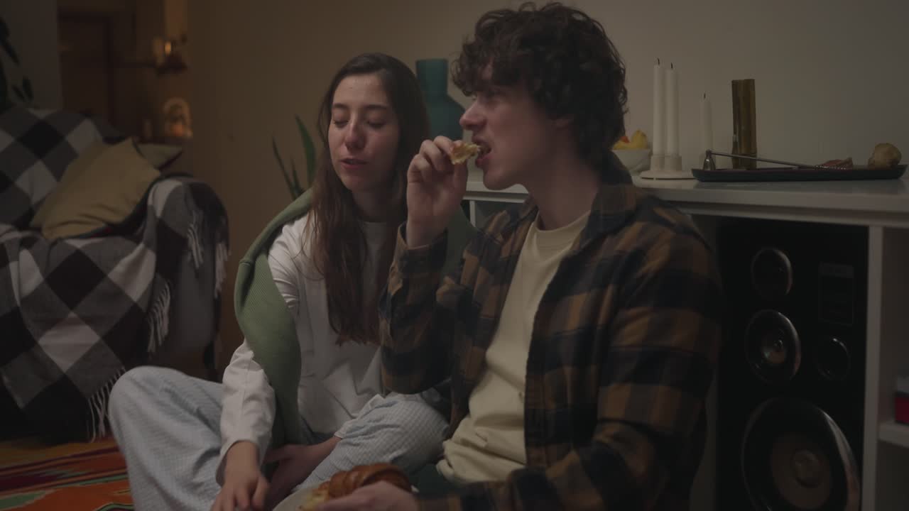 Couple Eating Indoors