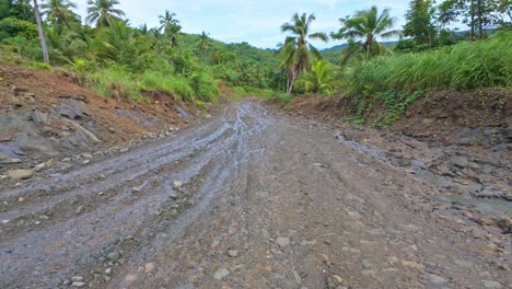 bike cam pov - slow descent on very muddy mining roads on dinagat island philippines where riding conditions are dangerous.