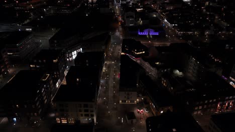 night time above city center of reykjavik capital of iceland, aerial