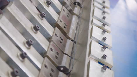 close up of steel bending in industrial metal folding machine, 4k