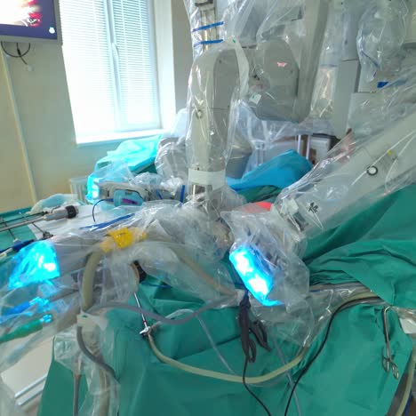 medical robot in modern operating room. surgical operation with robotic system. cancer removal surgery via minimally invasive robotic surgery. hi-tech medical robot