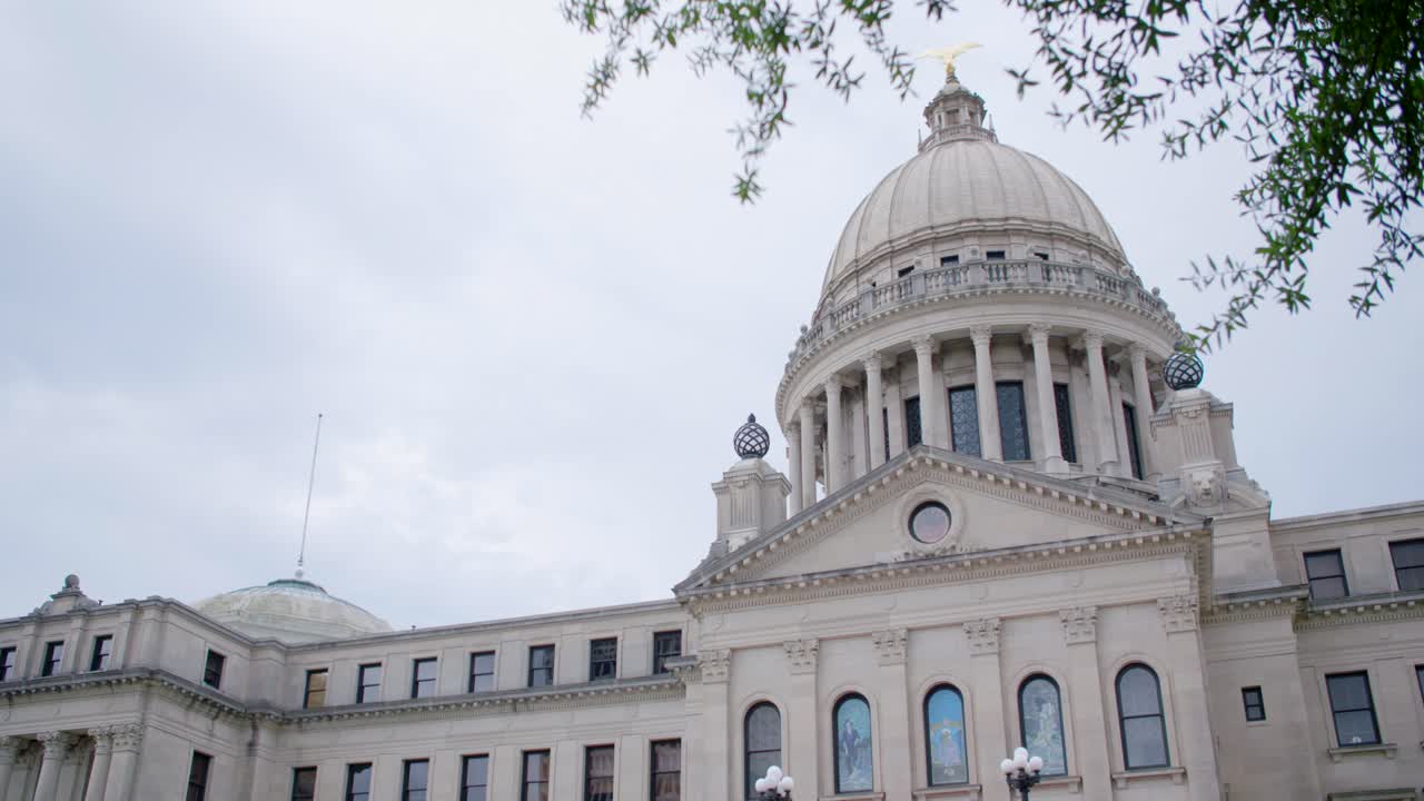 Medium, no rack: Stormy skies over the Mississippi State Capitol building. Jackson, MS