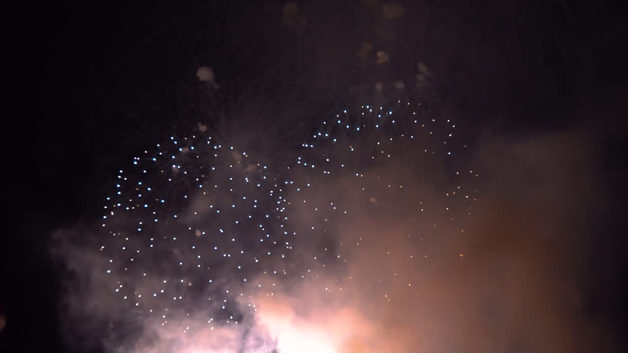 Beautiful Japanese Hanami fireworks exploding on night sky