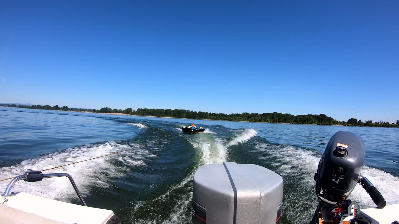Boat trip on columbia and willamette portland rivers. Oregon, US. Pull a tire. People.