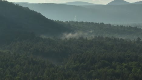 Aerial-within-the-heart-of-nature-mountainous-woodland