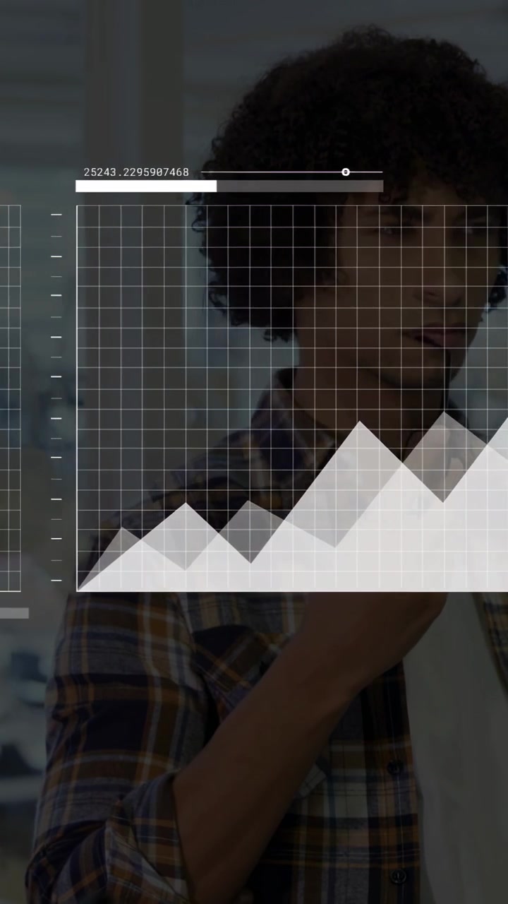 Vertical video: Man holding phone on call in tech, phone initiating HUD overlaying metrics on chest
