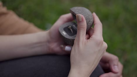 bride opens box with engagement ring