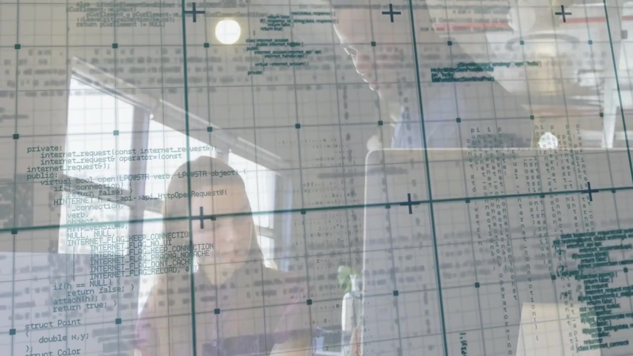 Seated woman typing laptop colleague entering placing device, reviewing code overlay for tech