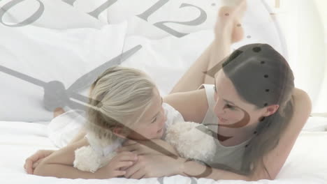 Clock-animation-over-mother-and-child-lying-on-bed-with-stuffed-animal