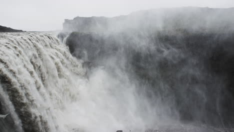 Slow-motion-cinematic-footage-with-slow-dolly-out-of-the-incredible-Dettifoss-falls-in-Iceland