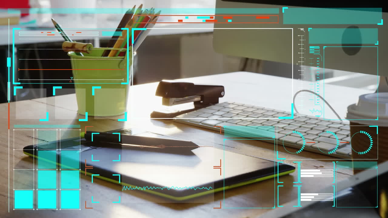 사무실의 책상 위에서 데이터 처리를 하는 화면의 애니메이션