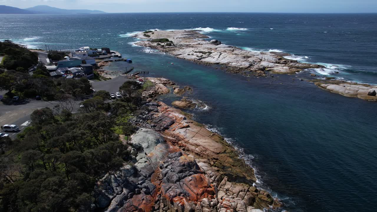 Red Rocks Of Bicheno Blowhole In Tasmania, Australia - Drone Pullback
