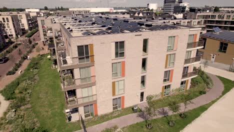 aerial pan showing exterior facade of social housing collective building ubuntuplein project in zutphen, the netherlands