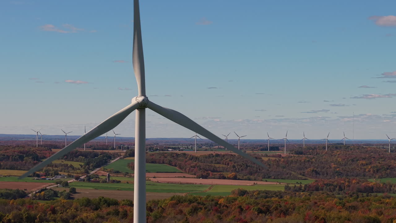 Wind Turbines in Autumn Landscape