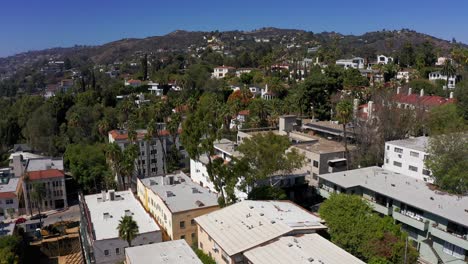 Low-panning-aerial-shot-of-the-Hollywood-Hills-in-Los-Angeles,-California