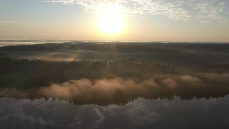 drone aerial view of foggy morning in lithuania