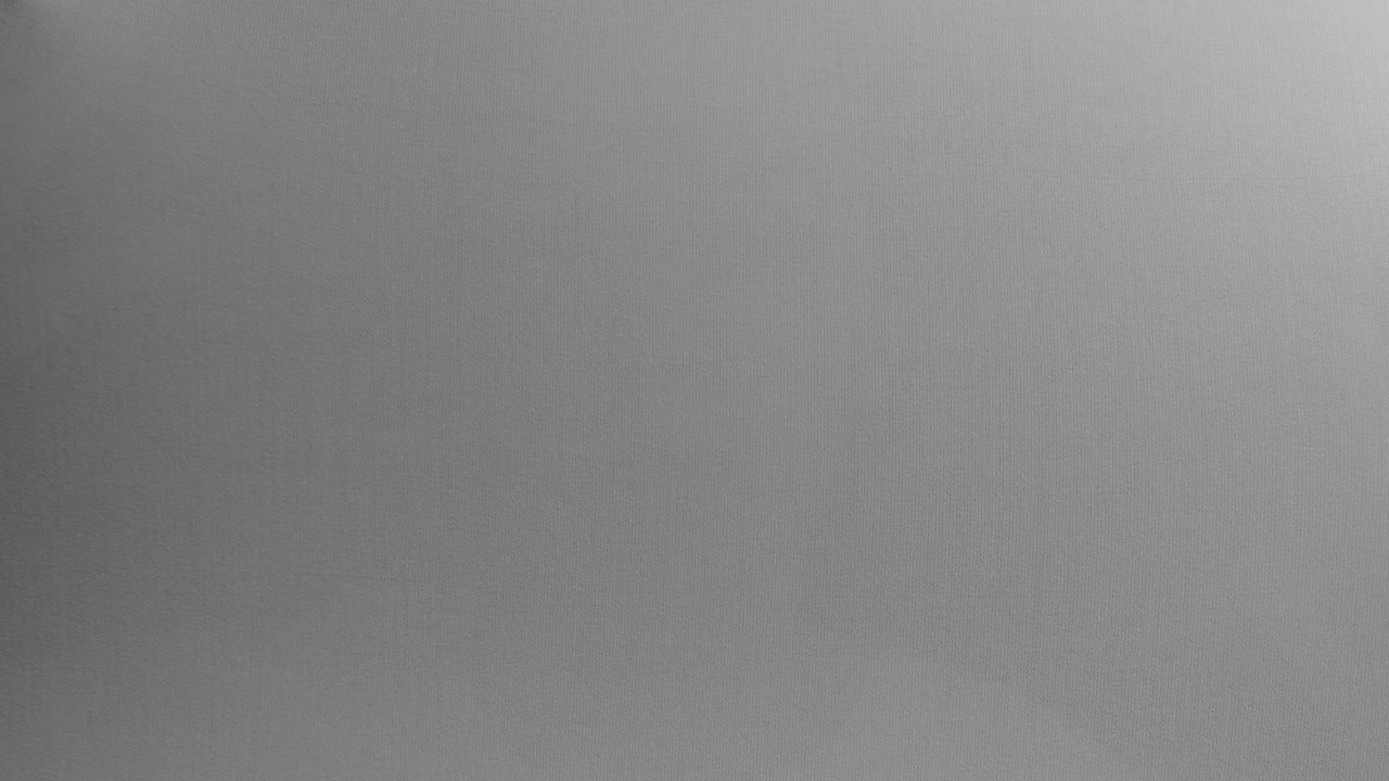 Creepy silhouettes of a woman's hands appears from the white surface