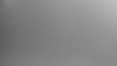 creepy silhouettes of a woman's hands appears from the white surface